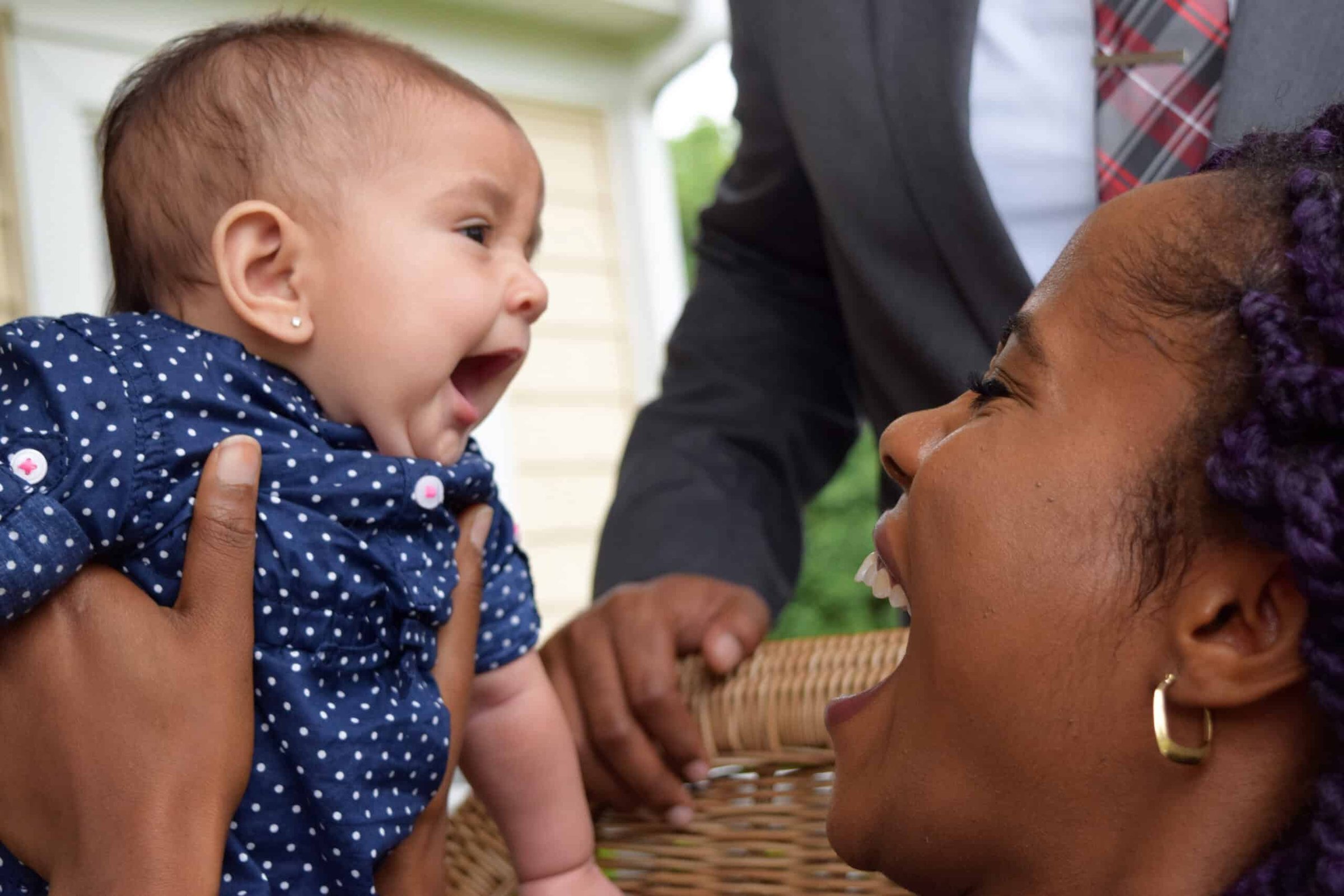 black-woman-lifting-up-and-smiling-and-laughing-wi-2024-11-26-13-43-54-utc-scaled