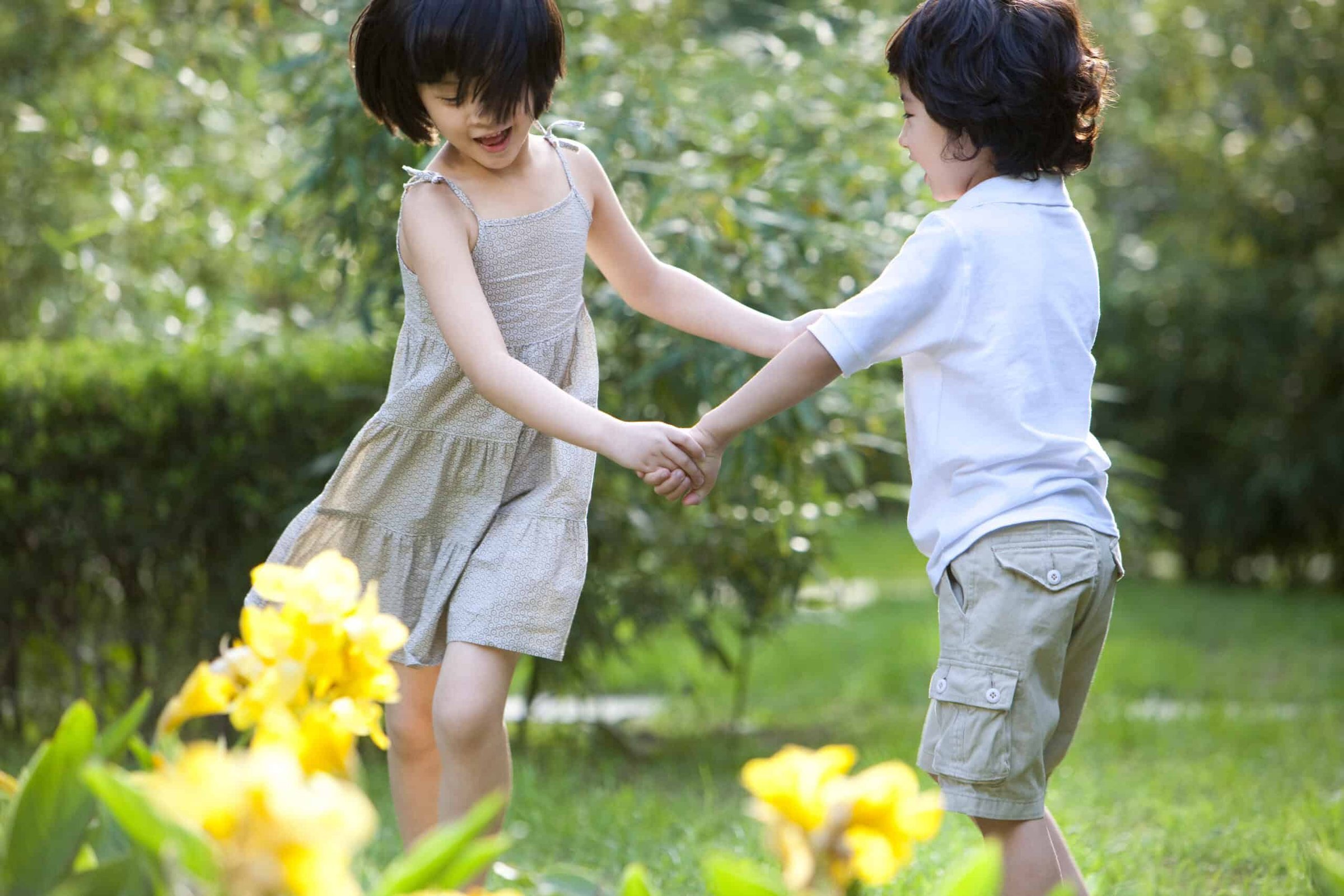 cute-children-having-fun-in-garden-2024-10-18-03-29-07-utc-scaled