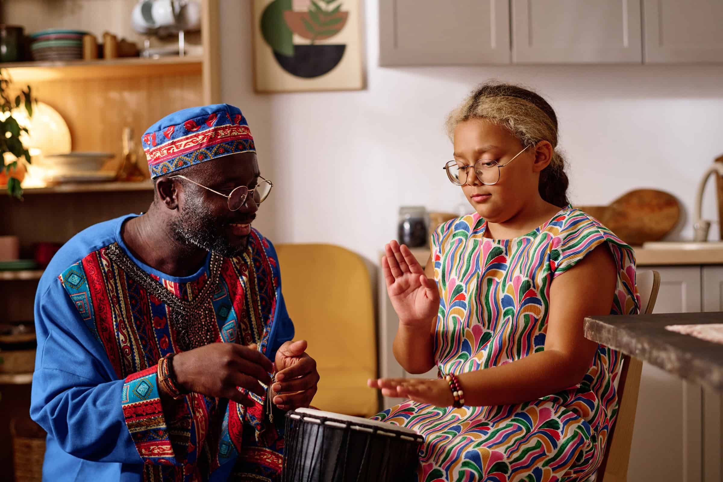 cute-girl-in-national-attire-beating-drum-while-le-2025-02-11-15-46-19-utc