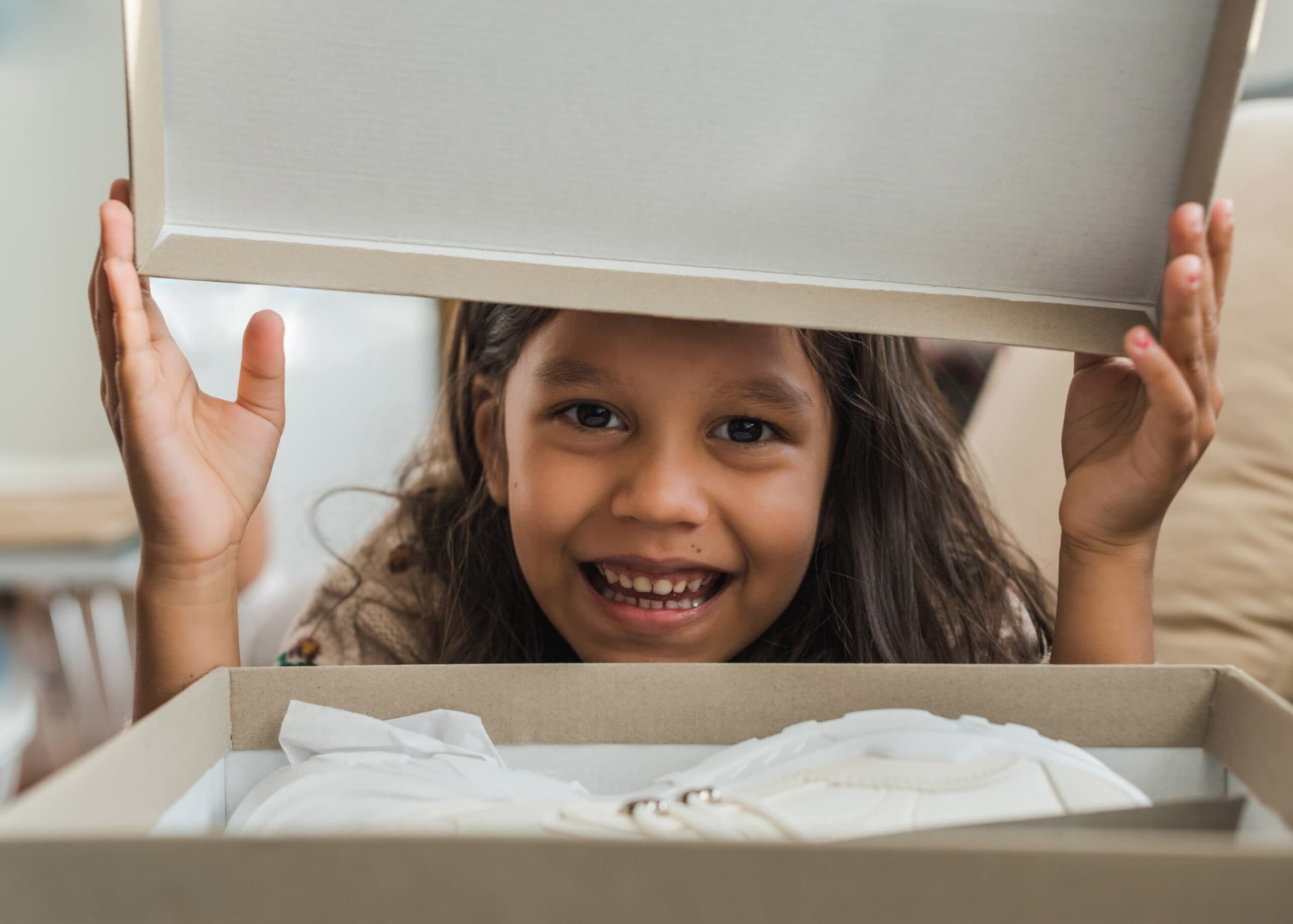 framed-photo-of-a-cute-girl-opening-a-box-2025-02-02-15-23-45-utc-scaled