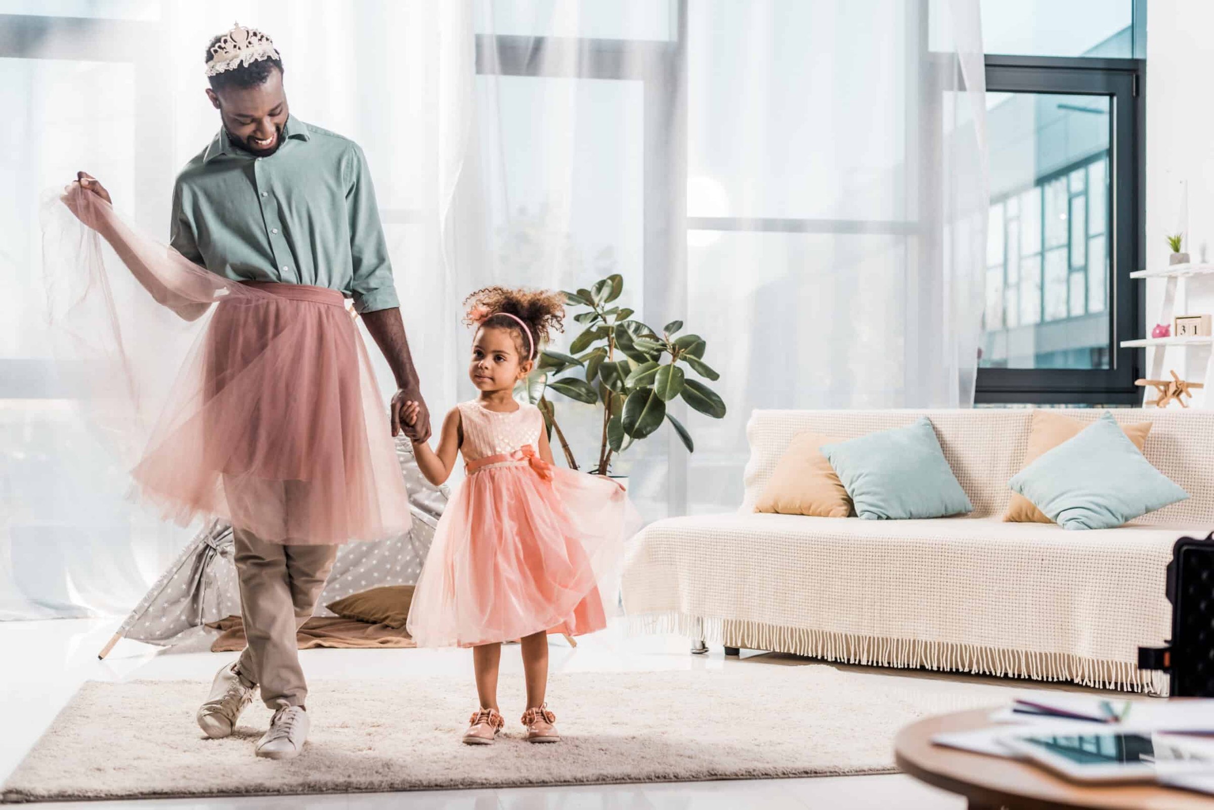 happy-african-american-father-in-cute-pink-tutu-an-2024-11-17-17-23-41-utc-scaled (1)