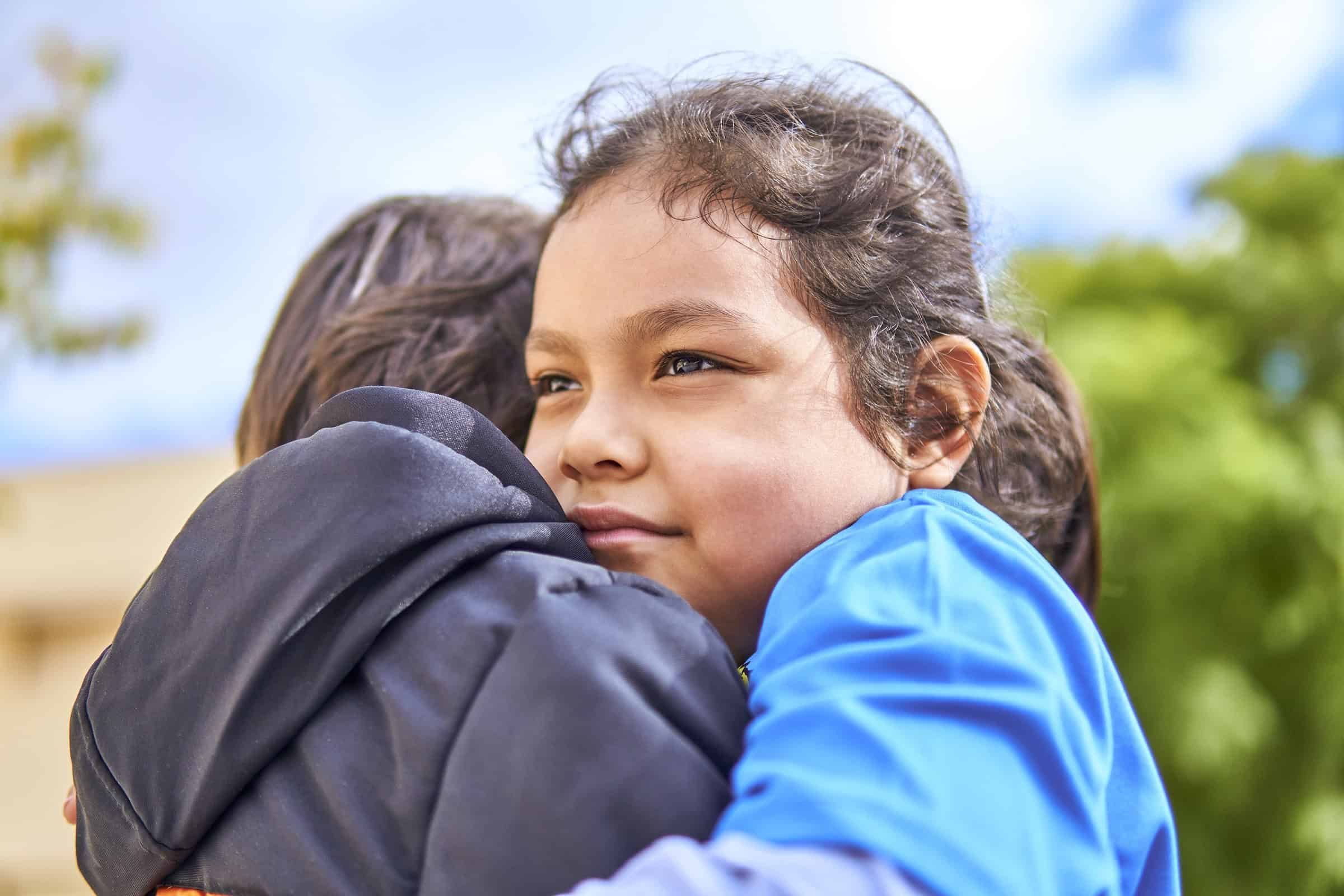 latin-girl-hugging-boy-with-love-and-hope-2024-12-01-09-27-37-utc