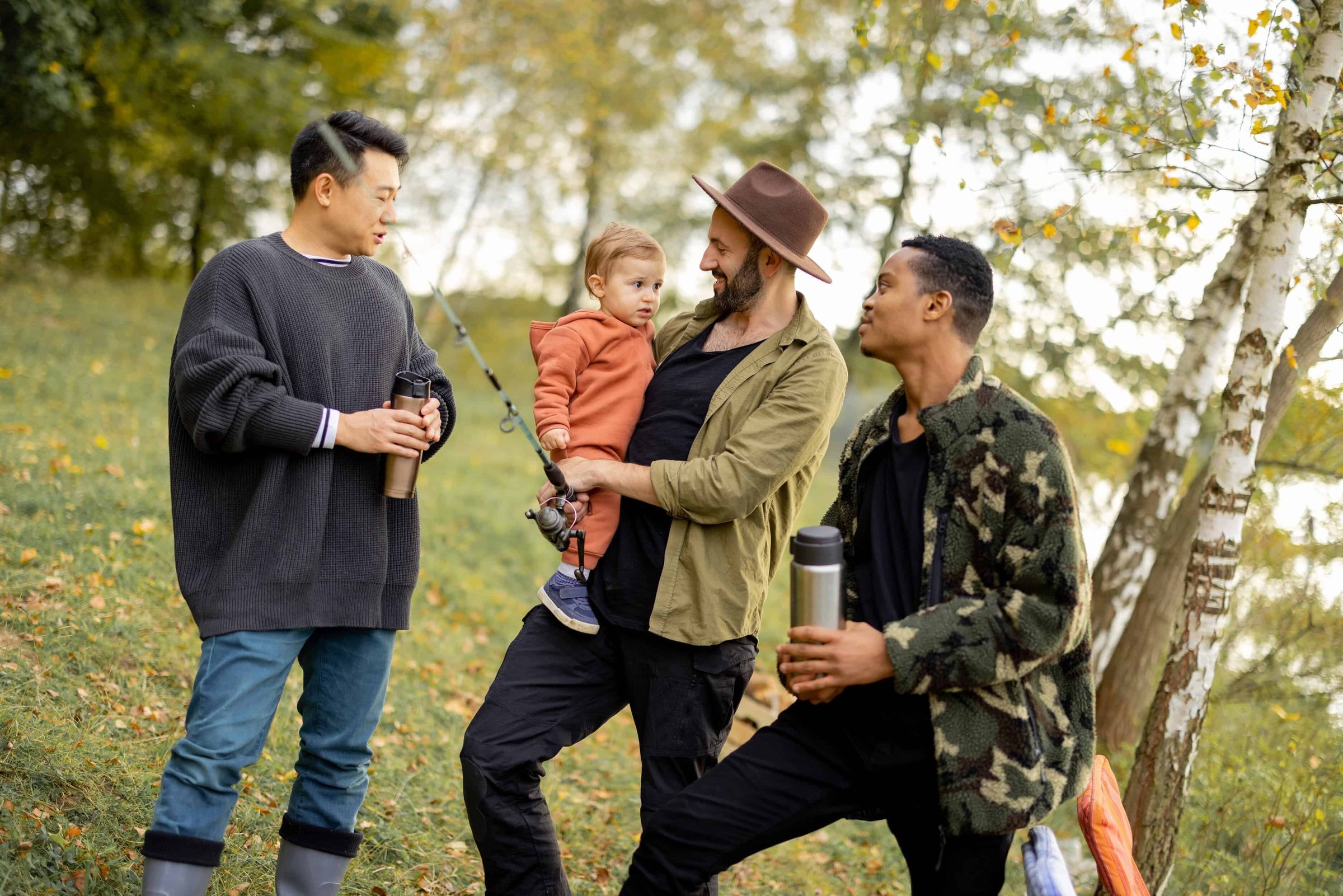 multiracial-male-friends-rest-in-nature-at-autumn-2025-03-13-04-15-39-utc