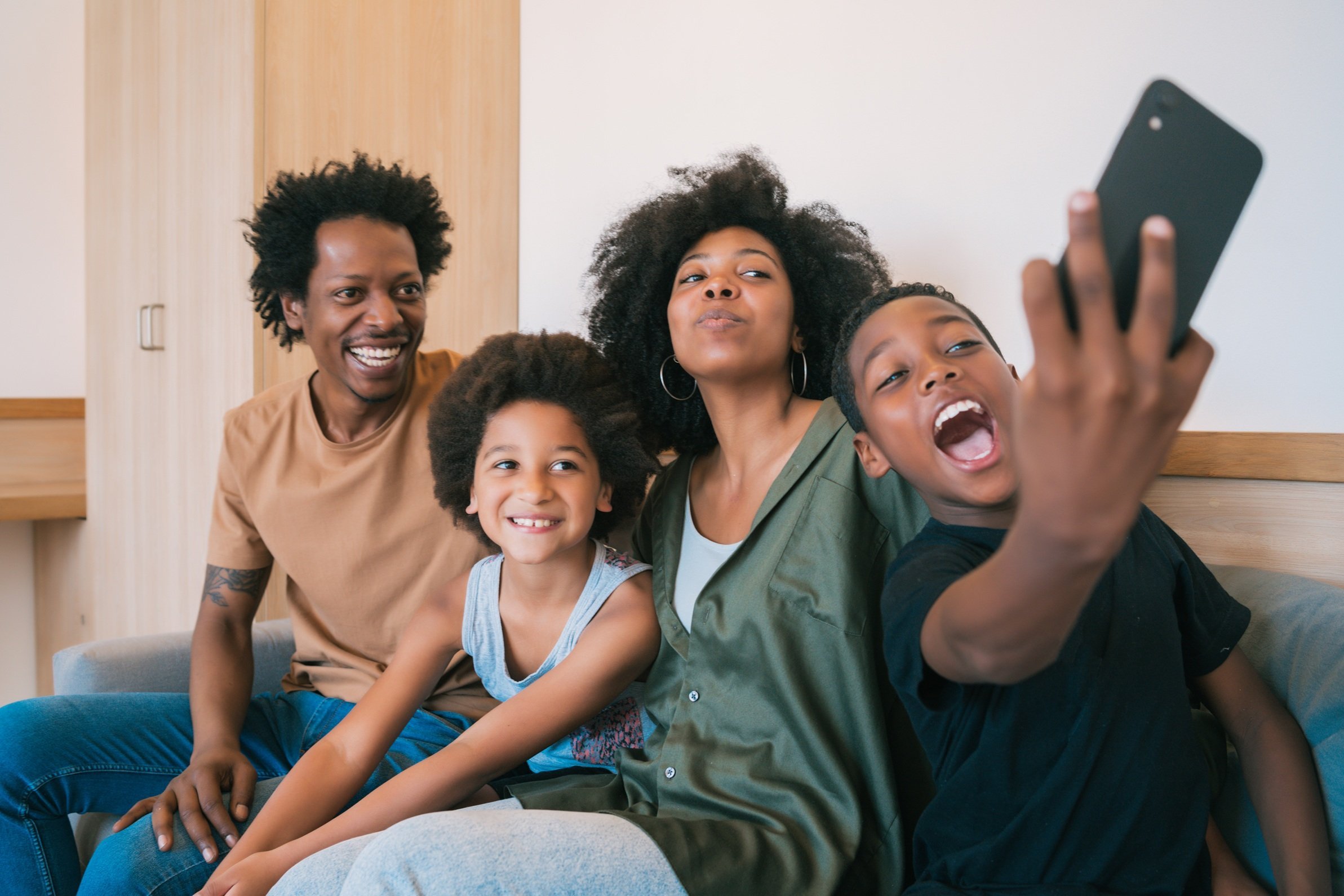 portrait-of-african-american-family-taking-a-selfi-2026-03-26-10-06-37-utc