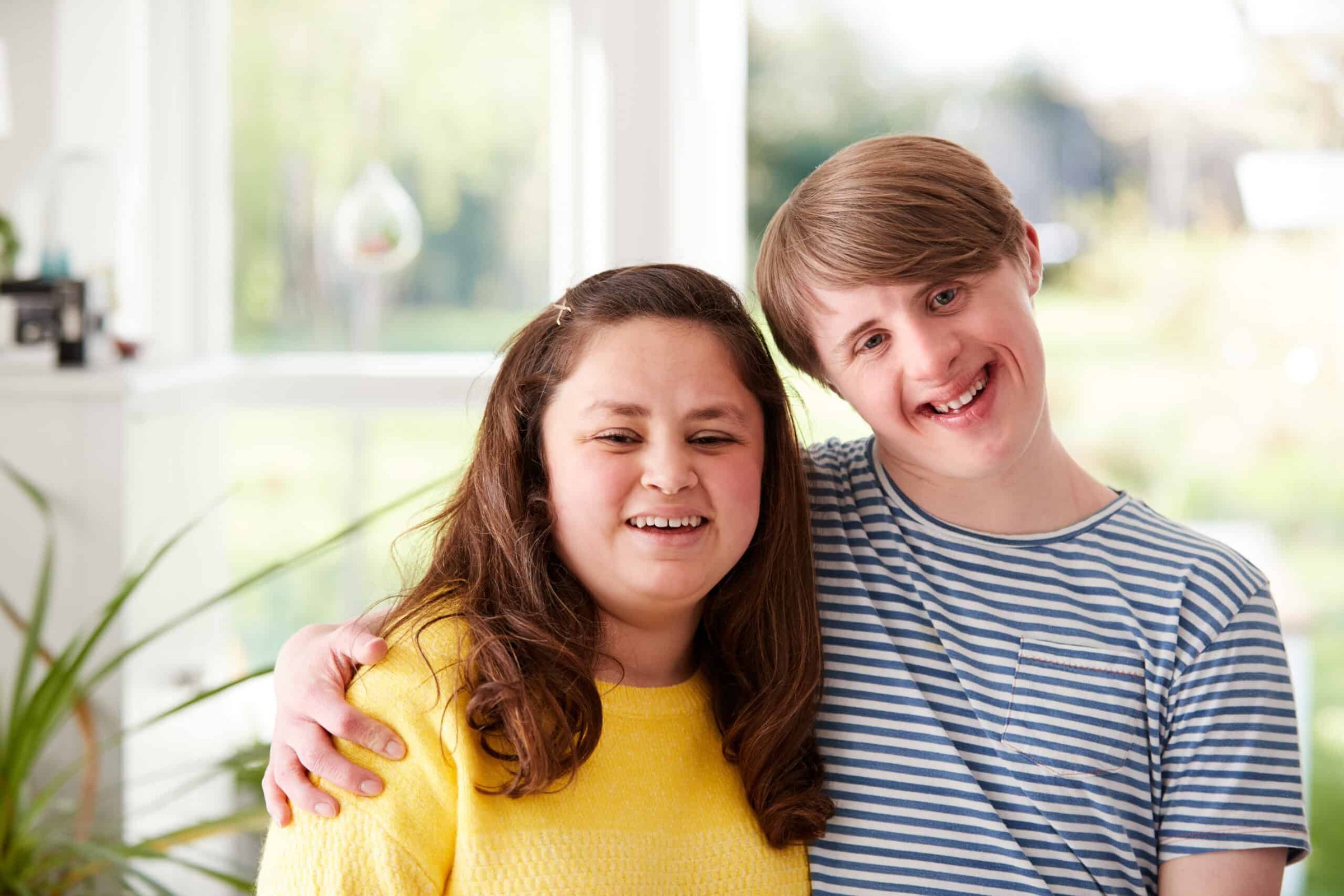 portrait-of-loving-young-downs-syndrome-couple-at-2024-10-19-15-24-44-utc-scaled