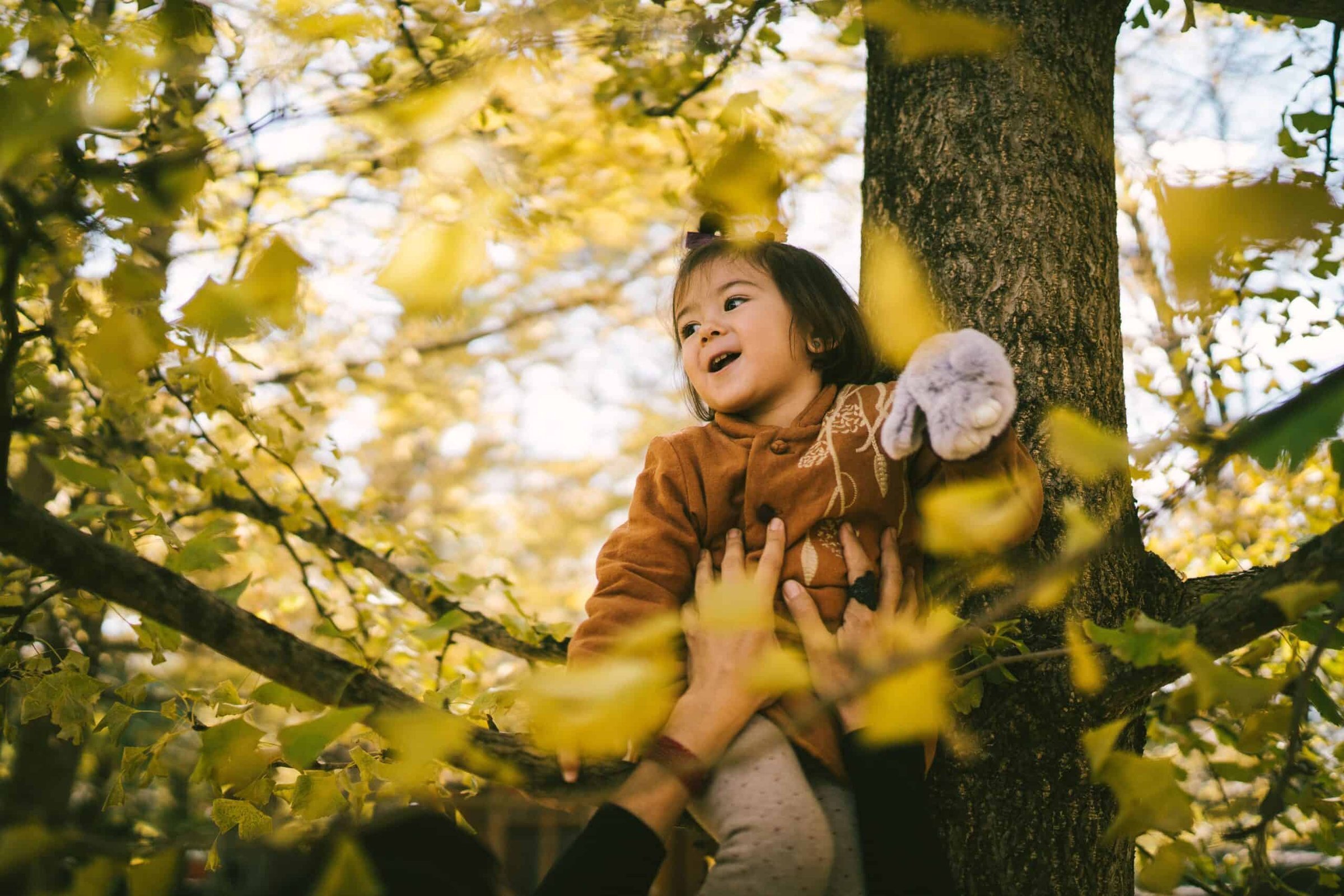 smiling-baby-girl-enjoying-a-sunny-day-in-a-park-o-2025-02-09-07-16-35-utc-scaled