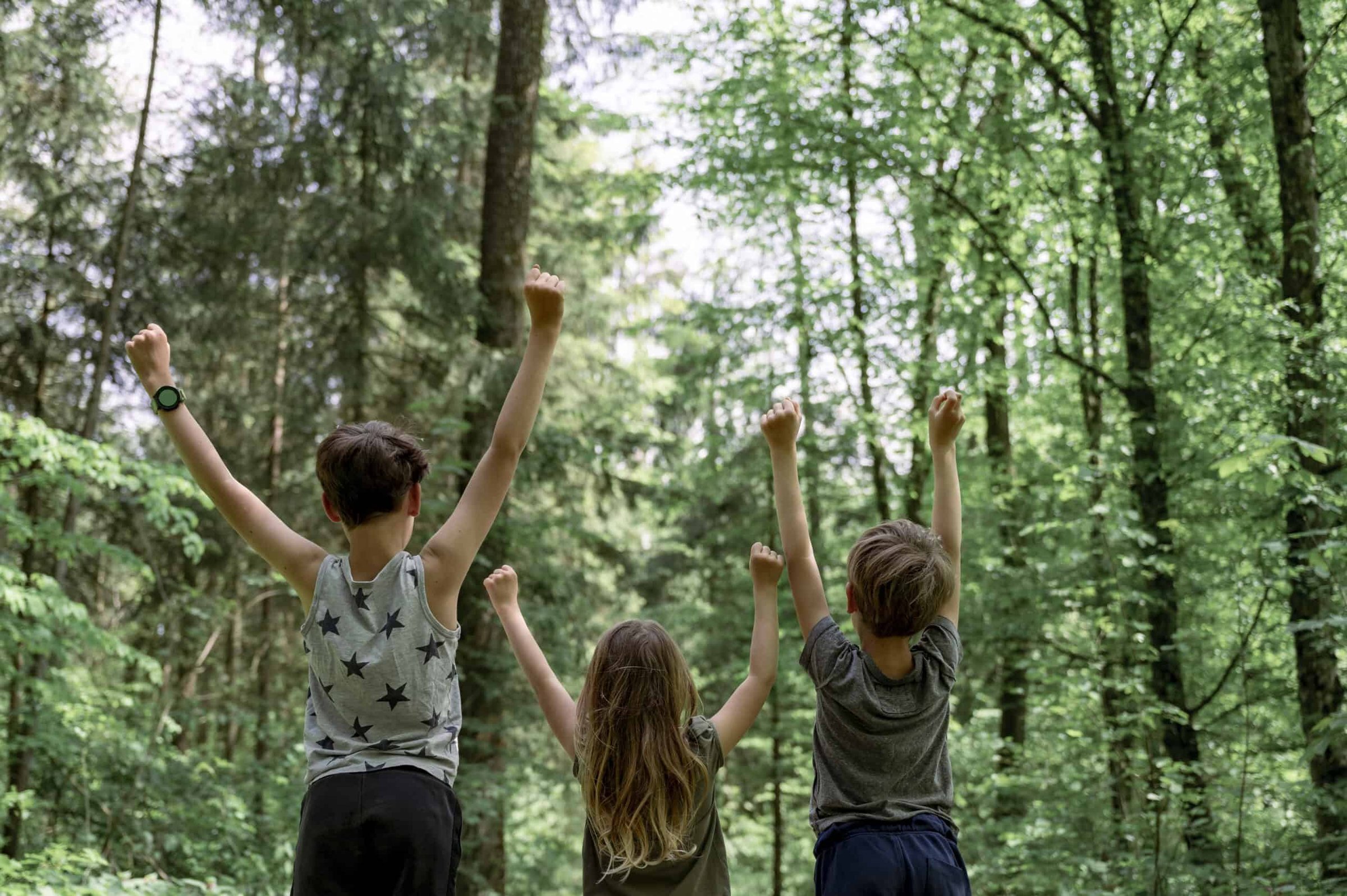 three-kids-enjoying-life-standing-next-to-each-oth-2025-02-19-03-18-12-utc-scaled