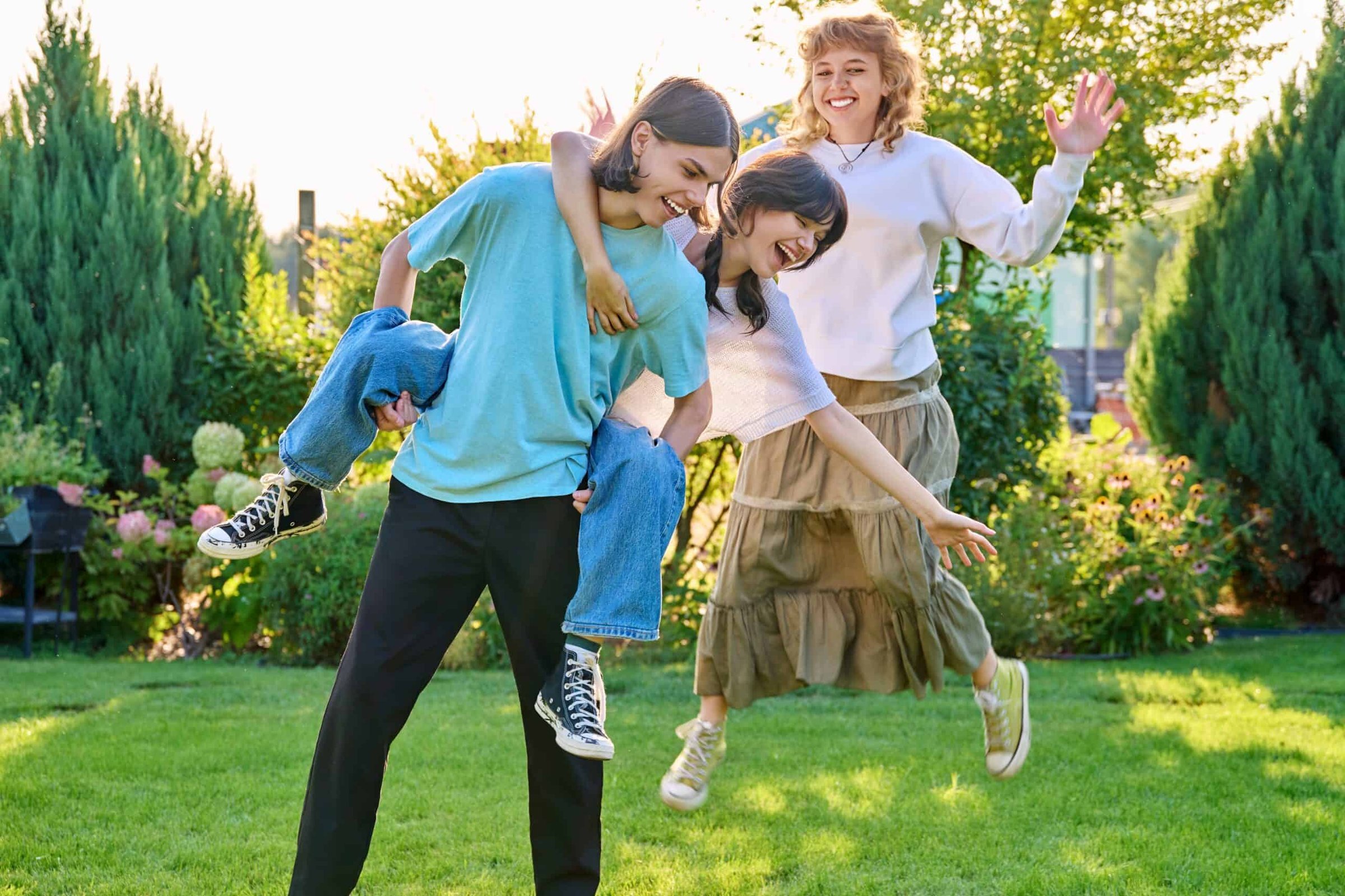 three-teenage-friends-having-fun-outdoor-sunny-su-2024-12-08-05-07-57-utc-scaled